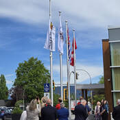 Raising the Canadian flag and flags for Katzie First Nation, City of Pitt Meadows and the Province of BC