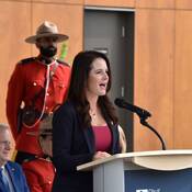 Mayor Nicole MacDonald at the podium giving a speech