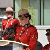 S/Sgt. Michelle Luca at the podium giving a speech